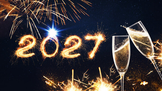 Happy New Year 2027 celebration with sparkler numbers, fireworks, and clinking champagne glasses against dark night sky background. Festive holiday design for banner, greeting card, party invitation.