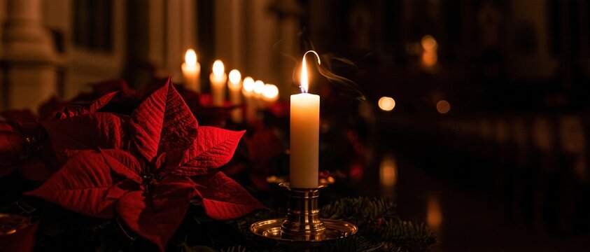 Red poinsettias and glowing white candles in brass holders along church pews, a serene festive scene for Christmas and Advent