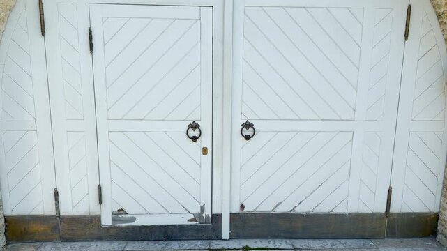 POV walkthrough of an empty historic white door in Catherine Park, Pushkin, Saint Petersburg shot on stabilizer. Smooth forward camera motion brings a peaceful, calm, and serene feeling.