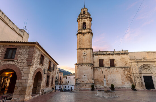 Plaza de la Constituci&oacute;n with the Church of Our Lady of the Assumption in Biar, Alicante (Spain), bathed in morning light