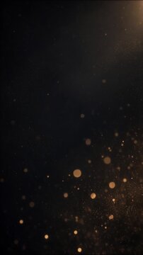 Golden dust particles floating in dark atmospheric space with warm volumetric light beam for overlay background