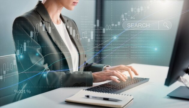 A businesswoman types at a desk computer while a digital search interface and financial charts display overlaying the office environment.