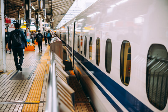 Japanese Shinkansen high-speed train stopped at a platform at Tokyo station in Tokyo, Japan.