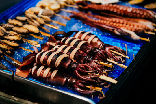 Different kinds of seafood on sale at the Kuromon Ichiba market in Osaka, Japan.