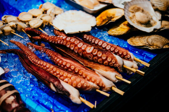 Different kinds of seafood on sale at the Kuromon Ichiba market in Osaka, Japan.