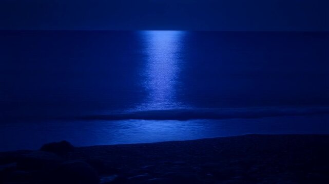 Moonlight shimmering on a calm sea