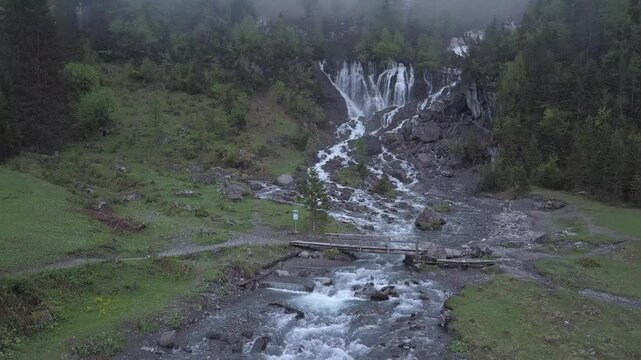 Waterfalls, Bi de Sibe Br&uuml;nne, sources of the Simme, drone shot, Lenk, Bern, Switzerland
