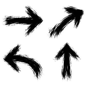 Set of black grunge brush stroke arrows on white background