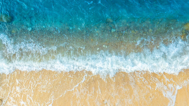 Nature of the ocean and blue sky Summer with sunshine, sandy beaches, clear blue waters sparkling against the blue sky. on an island with good ecology and environment Background for summer vacation