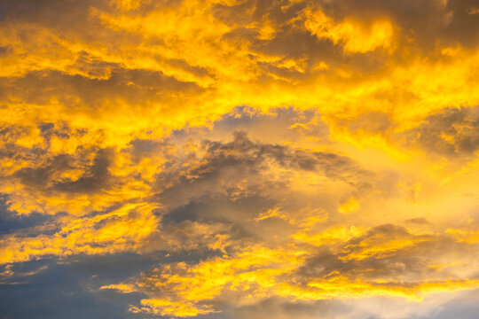 Enjoy a panoramic view of the skyline. The sun rises in the morning sky with colorful clouds. and beautiful cloud patterns In the soft light of the morning	