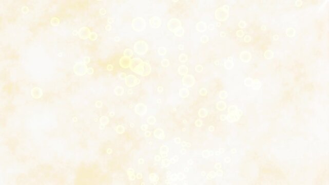 Swirling Glowing Bubbles on Soft Champagne Gold Abstract Background