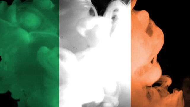 Abstract background with the irish flag colors green, white, and orange depicted as swirling smoke plumes in a dark environment
