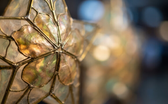 Capiz shell star lantern glowing for Christmas decoration and holiday festive celebration