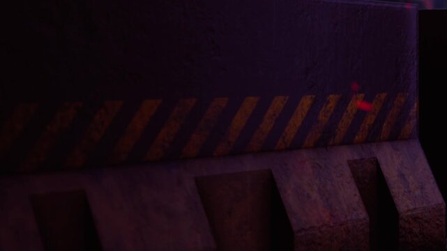 Industrial hallway feature heavy concrete barriers with yellow caution stripes under dim red light at night