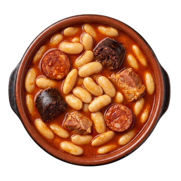 Hearty Spanish fabada asturiana white bean stew with sliced chorizo and morcilla sausages served in a terracotta bowl for culinary menus on transparent background