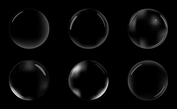 Realistic soap bubbles and glass ornaments set isolated on black background