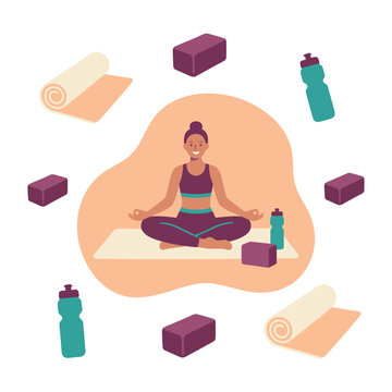 Yoga: yogi sits in lotus pose on a yoga mat with hands resting