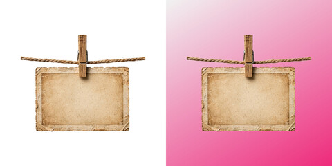 Blank Vintage Paper Card, aged note hanging on twine rope with wooden clothespin © Design Helbox