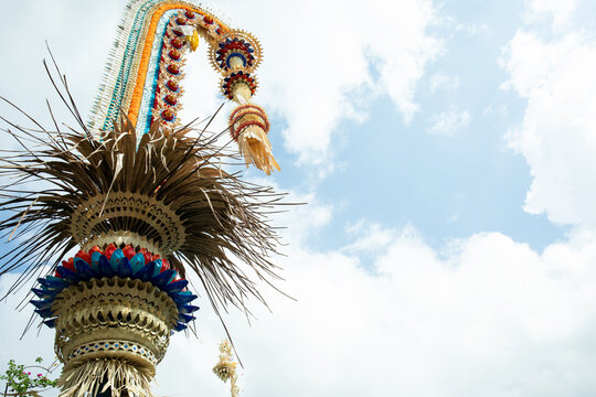 Penjor. Penjor stands tall, showcasing intricate designs and vibrant colors