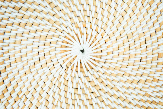 Rattan bag. Woven rattan bag displays beautiful circular patterns and handcrafted details