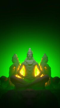 Meditating Statue Group with Golden Glow on Green Vertical