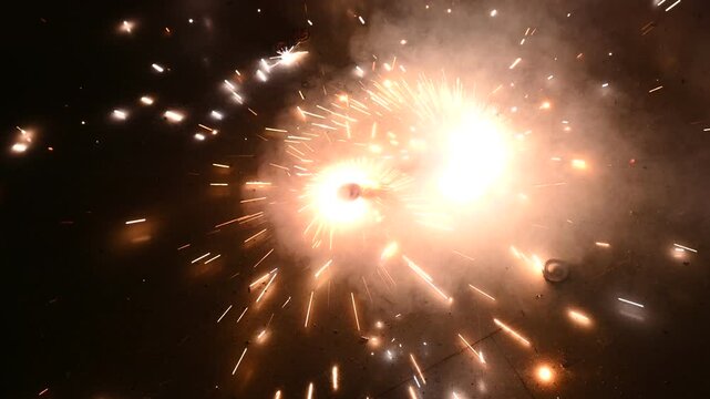 A type of firecracker or chakri spinning on the ground,during the Diwali festival celebrations in India.