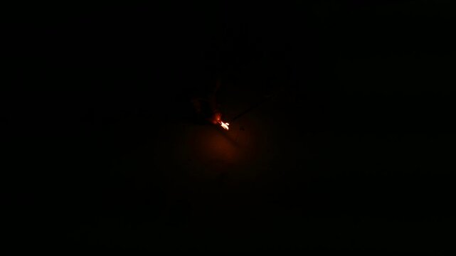 A type of firecracker or chakri spinning on the ground,during the Diwali festival celebrations in India.