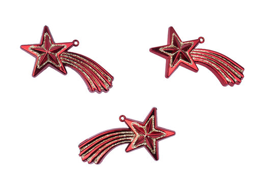 Set of three glossy red shooting star ornaments with gold glitter accents, isolated on a pure white background. Festive decorations ideal for Christmas mockups and seasonal holiday graphics.