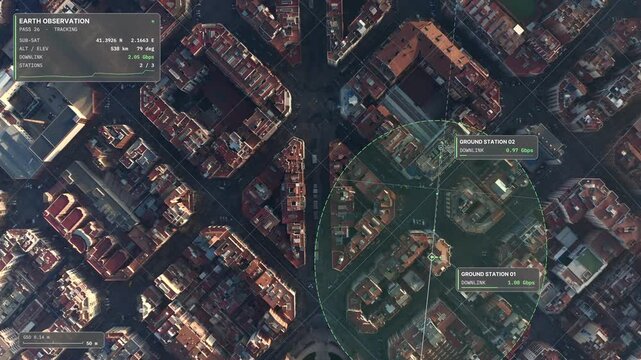 Top down aerial drift over Barcelona in low sun: octagonal city blocks, satellite ground track, sensor footprint and ground stations on an earth observation HUD overlay. Concept visualization