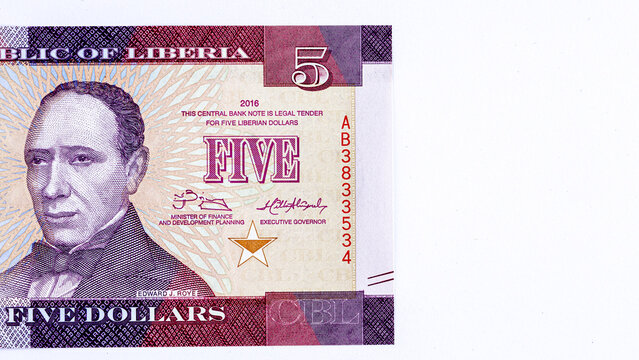 Close-up of a 5 Liberian dollars banknote featuring a portrait of Presiden. Detailed macro shot of Liberia currency paper money bill.