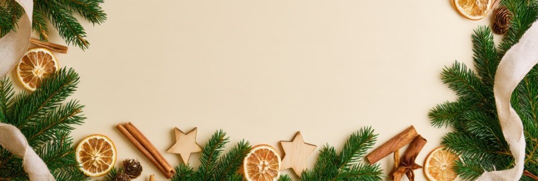 Nordic Christmas banner with evergreen branches, dried oranges, cinnamon and wooden stars