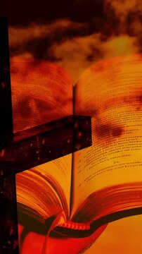 Vertical video: Cam panning right down, showing open book gutter, ribbon, cross framing prayer