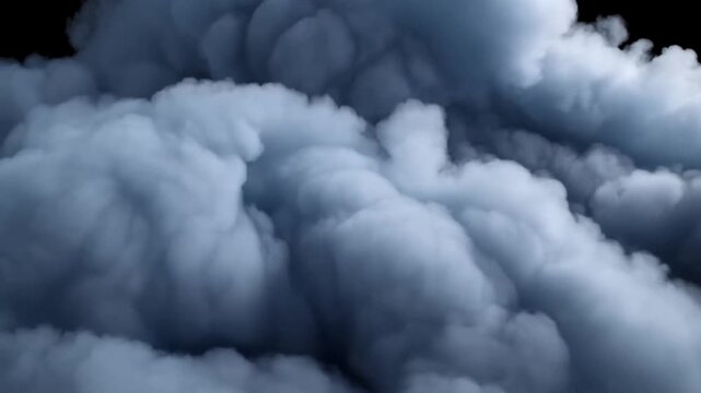 Dense bluegray smoke clouds billowing and rolling across a dark background