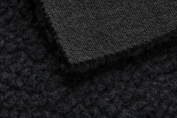 Luxury wool fabric texture premium black textile material for fashion design and tailoring high quality dark wool cloth surface with soft fleece detail © Adriano