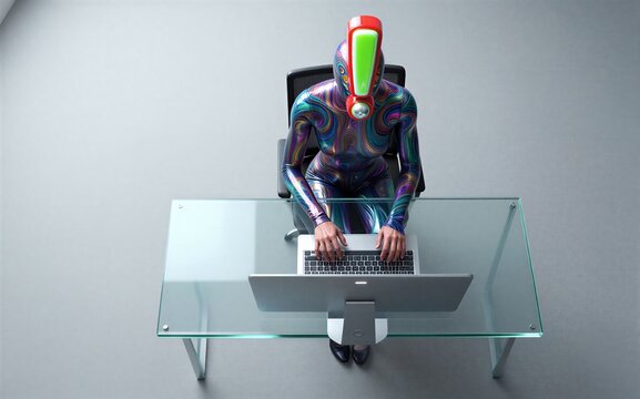 A colorful humanoid with a glowing red and green face sits at a glass desk using a laptop.