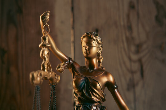 Statue of justice with scales of justice. Law and justice concept.