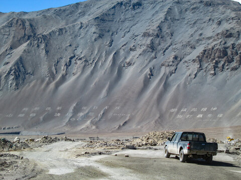 Truck on a rough road in a mountainous area with unique terrain