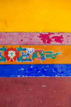Colorful painted wall bands with a floral motif at Thiksey monastery, Ladakh, Leh, India