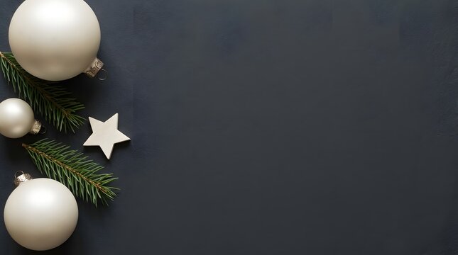 Festive winter scene with white ornaments star and evergreen branches on dark background