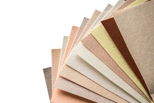 Fan of neutral felt fabric swatches in a warm natural color palette