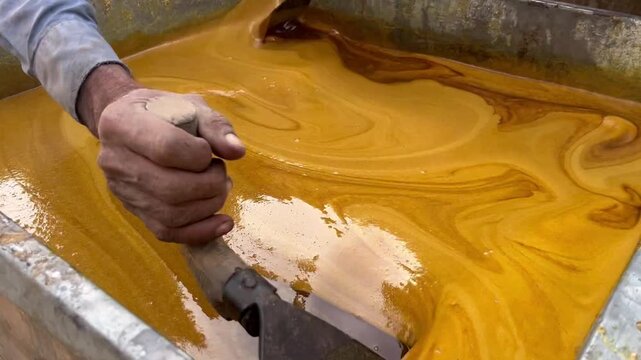 Traditional Gur Making Process with Thickened Sugarcane Juice and Rural Production Methods