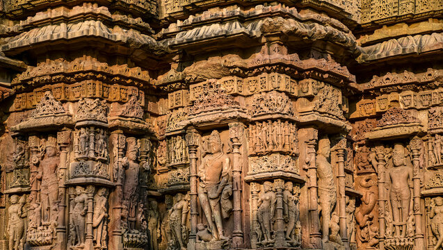 Carved Exterior wall and Pillar of the 11th century Sun Temple , Modhera in Gujarat