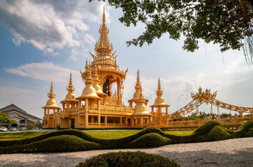 Golden Ganesha Shrine at Wat Rong Khun the White Temple, Ornate Traditional Thai Architecture under...