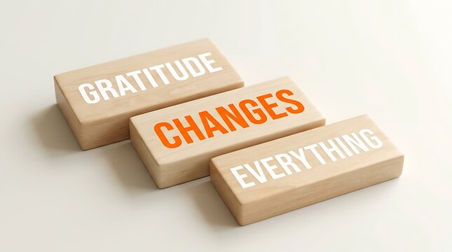 Three Wooden Blocks Stacked Showing Gratitude Changes Everything Positive Message Display