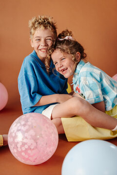 Real giggles between brother and sister