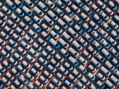 Aerial view new cars parked on parking lot
