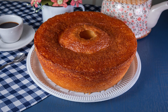 Brazilian cake with coffee on blue background