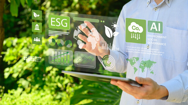 Businessman Analyzing ESG Environmental Social Governance Dashboard on Digital Tablet with Virtual Holographic Interface