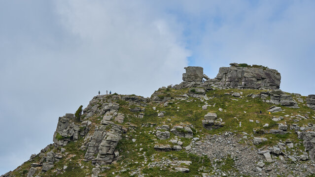 Hikers on the rocks at valley of rocks, Devon, England