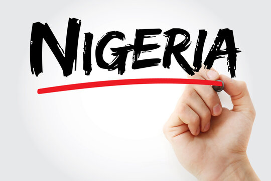 NIGERIA text on glass written by hand. Nigeria is a West African country on the Gulf of Guinea, known for its diverse ethnic groups and as Africa's most populous nation